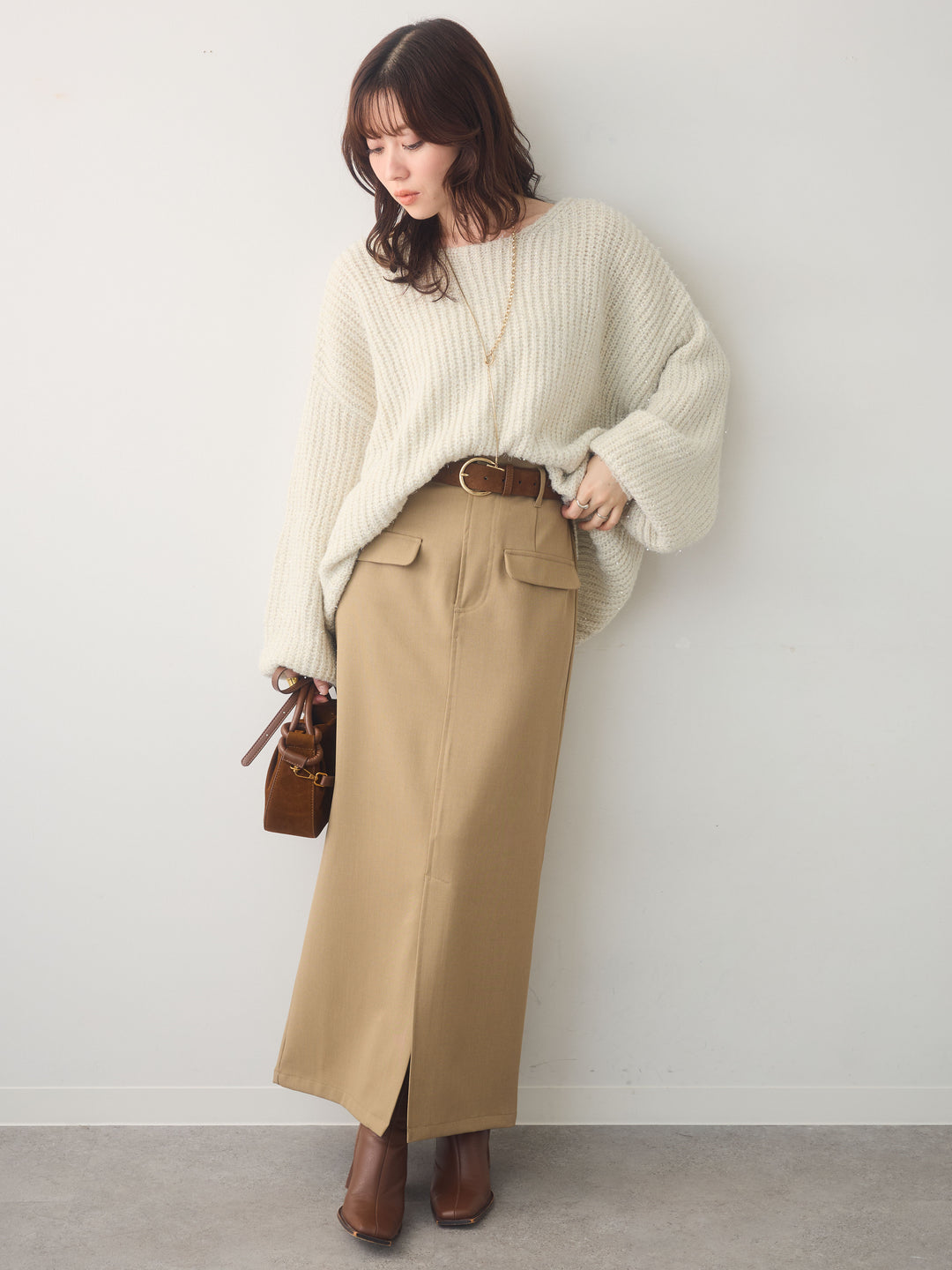 [SET]バルーンスリーブスパンリブニットトップス+クレープデシンフラップ付きストレートスカート(2set)