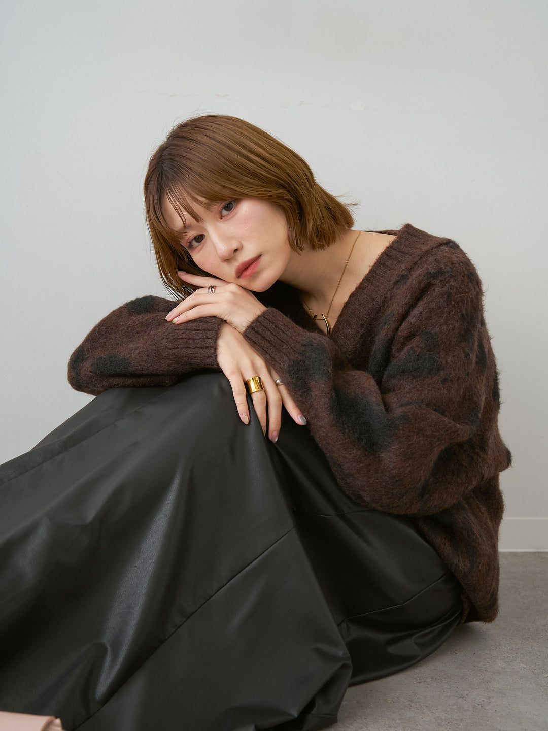 [SET]ダルメシアンオーバーニットプルオーバー+レザータッチフレアスカート(2set)