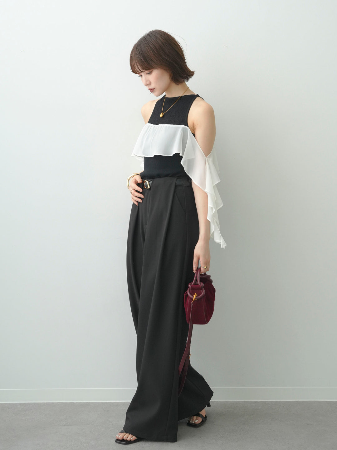 [予約]シフォンフリルドッキングノースリニットトップス/black