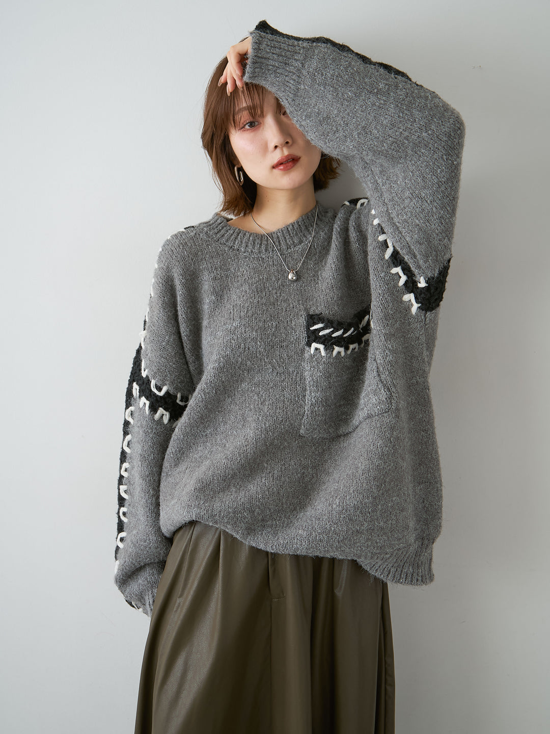 [SET]ハンドステッチデザインニットトップス+レザータッチフレアスカート(2set)