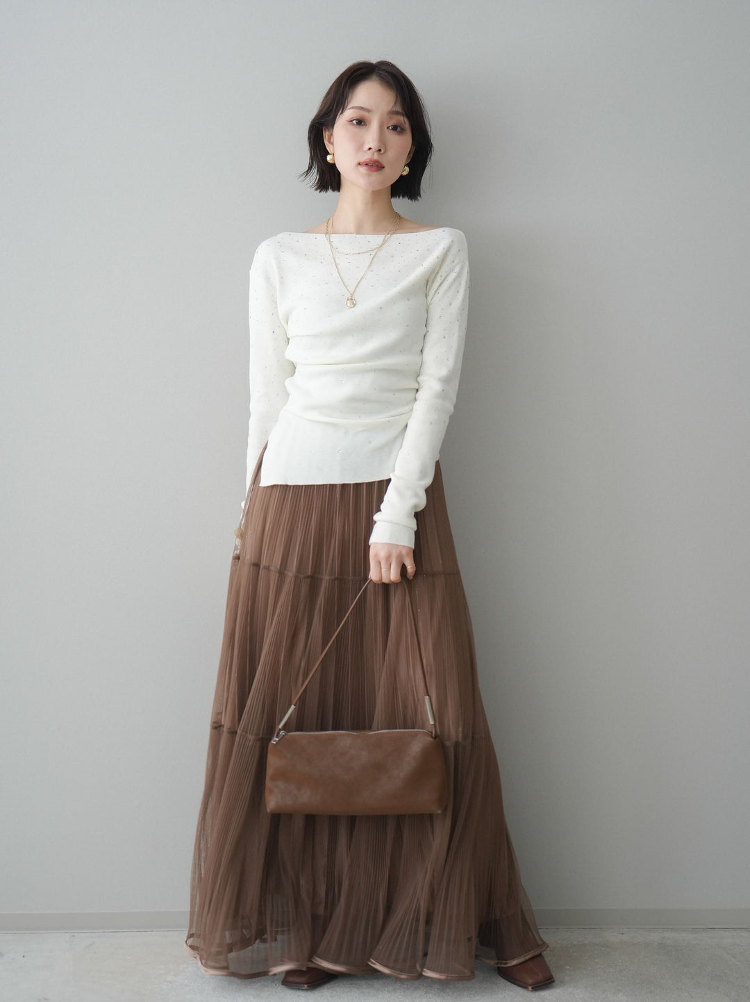 [予約]ラインストーンアシンメトリーニットトップス/ivory