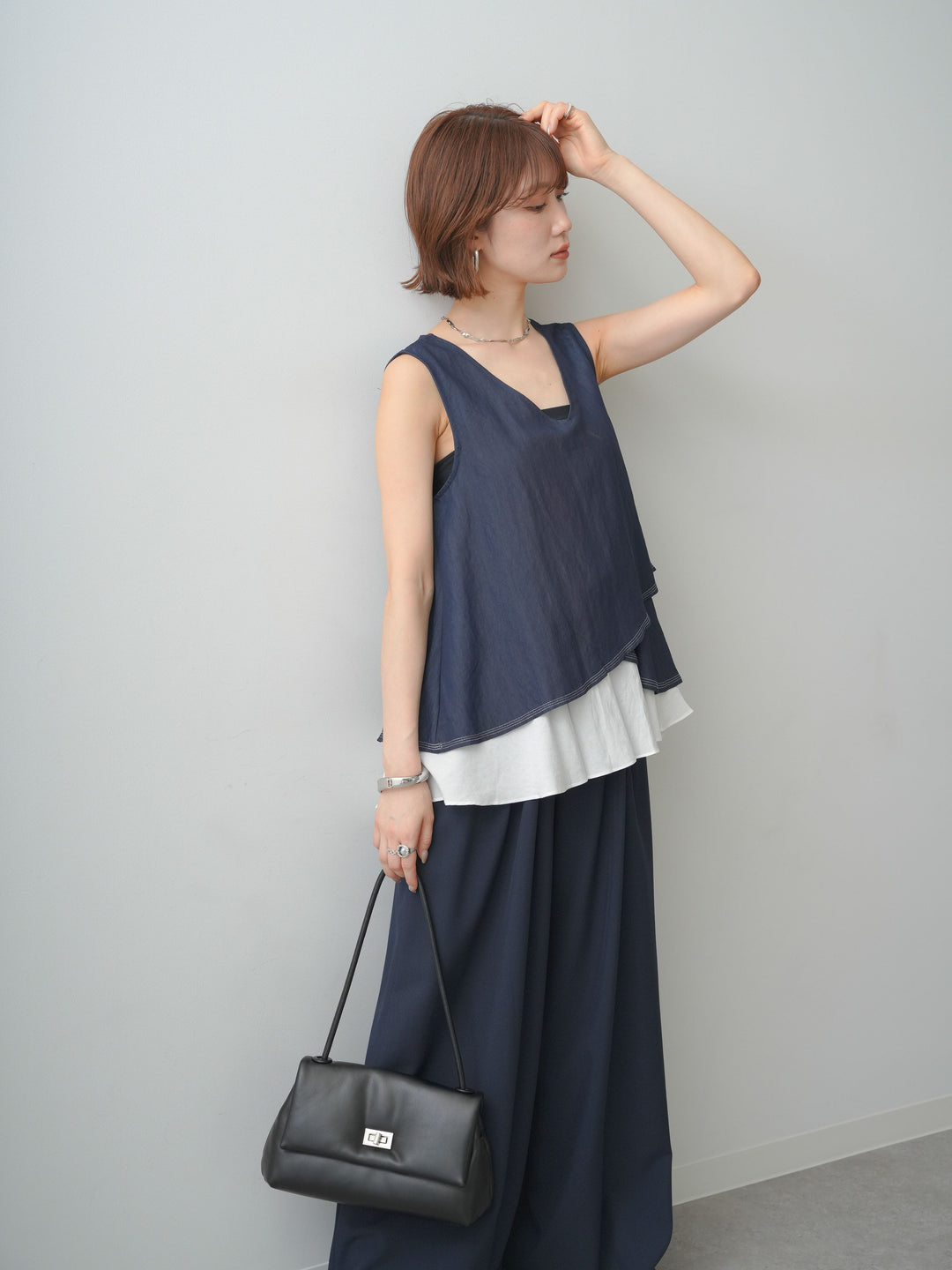 [予約]アシメフリルドッキングステッチノースリブラウス/navy