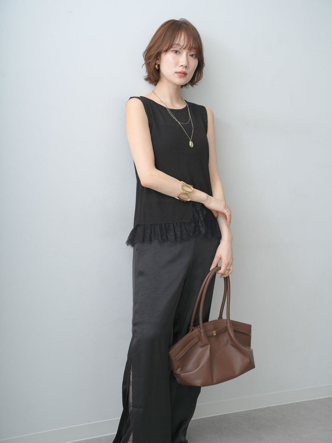 [予約]レースドッキングノースリニットトップス/black