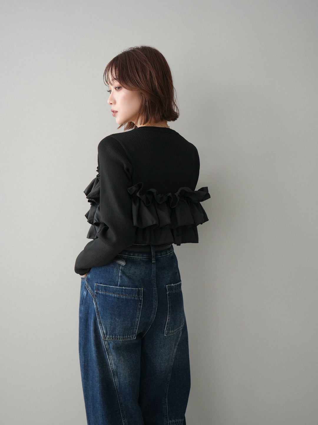 [予約]フリルビスチェドッキングスポンジニットプルオーバー/black