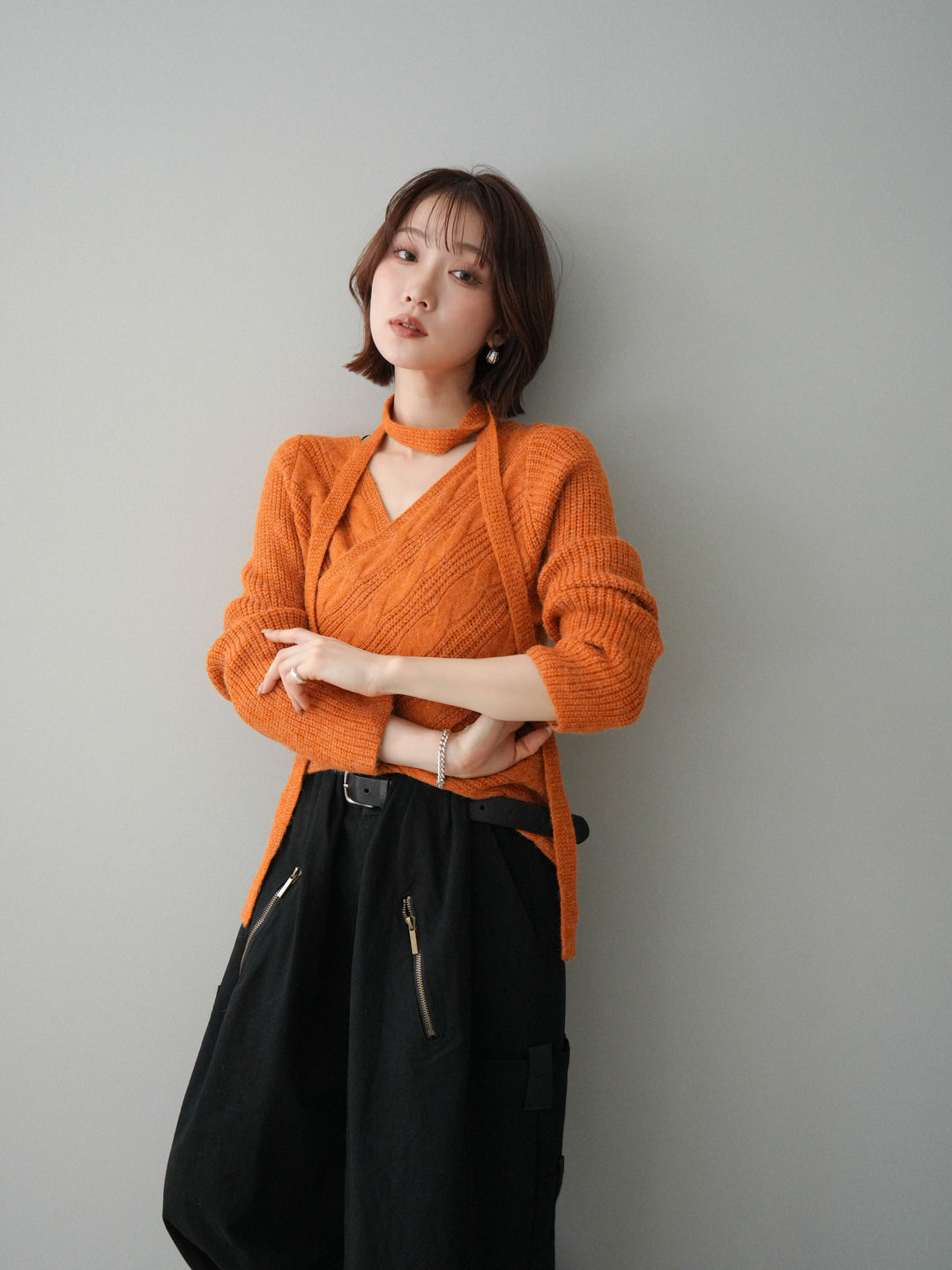 [予約]ケーブル編みクロスニットトップス/orange
