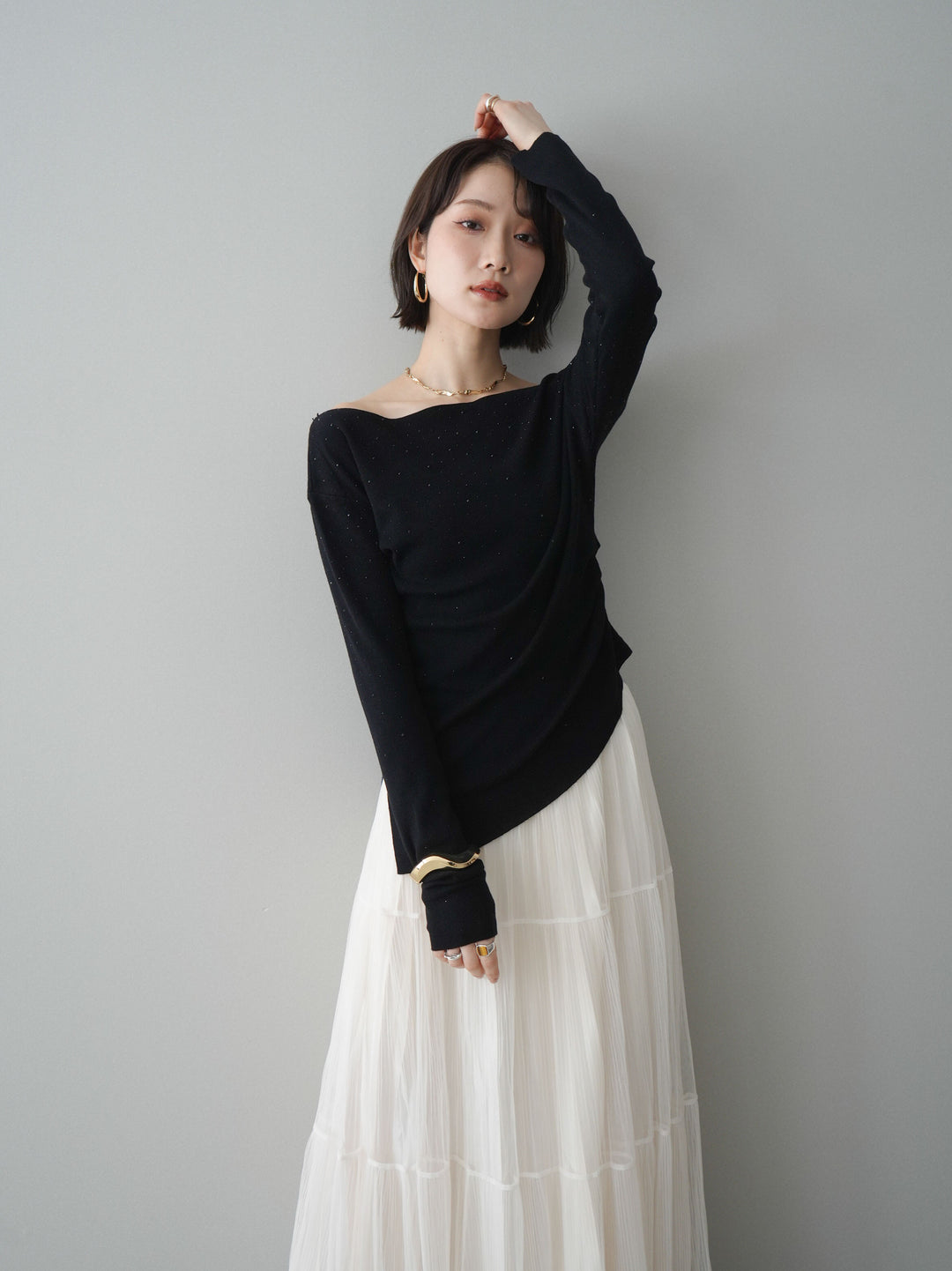 [予約]ラインストーンアシンメトリーニットトップス/black