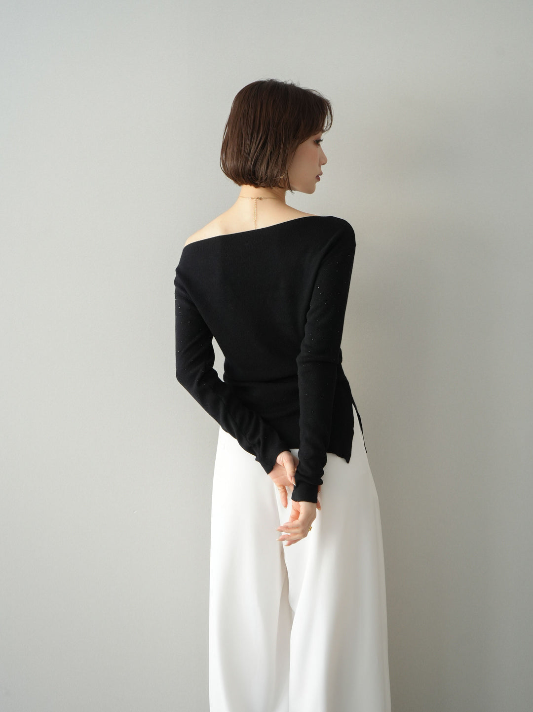 [予約]ラインストーンアシンメトリーニットトップス/black