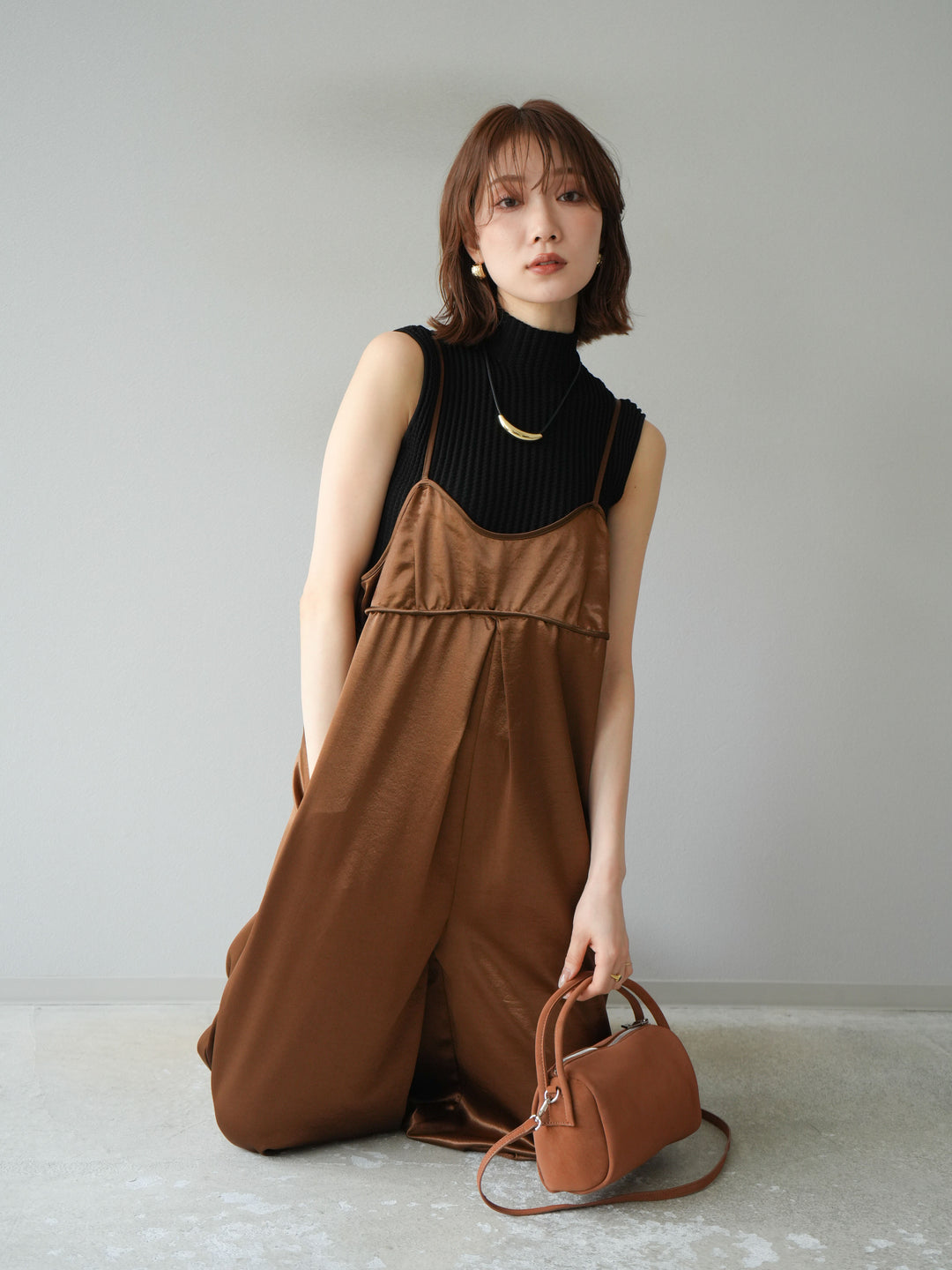 [予約]ボトルネックワッフル編みノースリーブニットトップス/ブラック