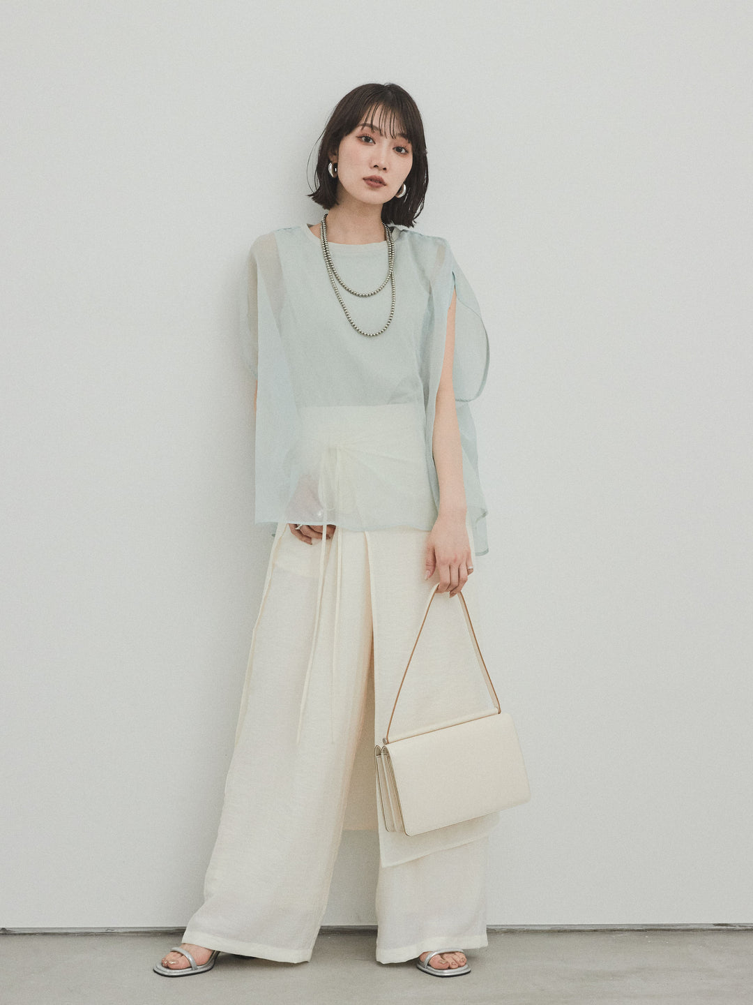 [SET]コンパクトスムースシアーレイヤードトップス+ワッシャーサテンレイヤードスカートパンツ(2set)