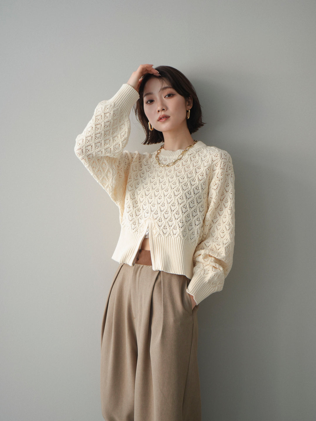 [予約]透かし編みフロントジップスリットニットプルオーバー/ivory