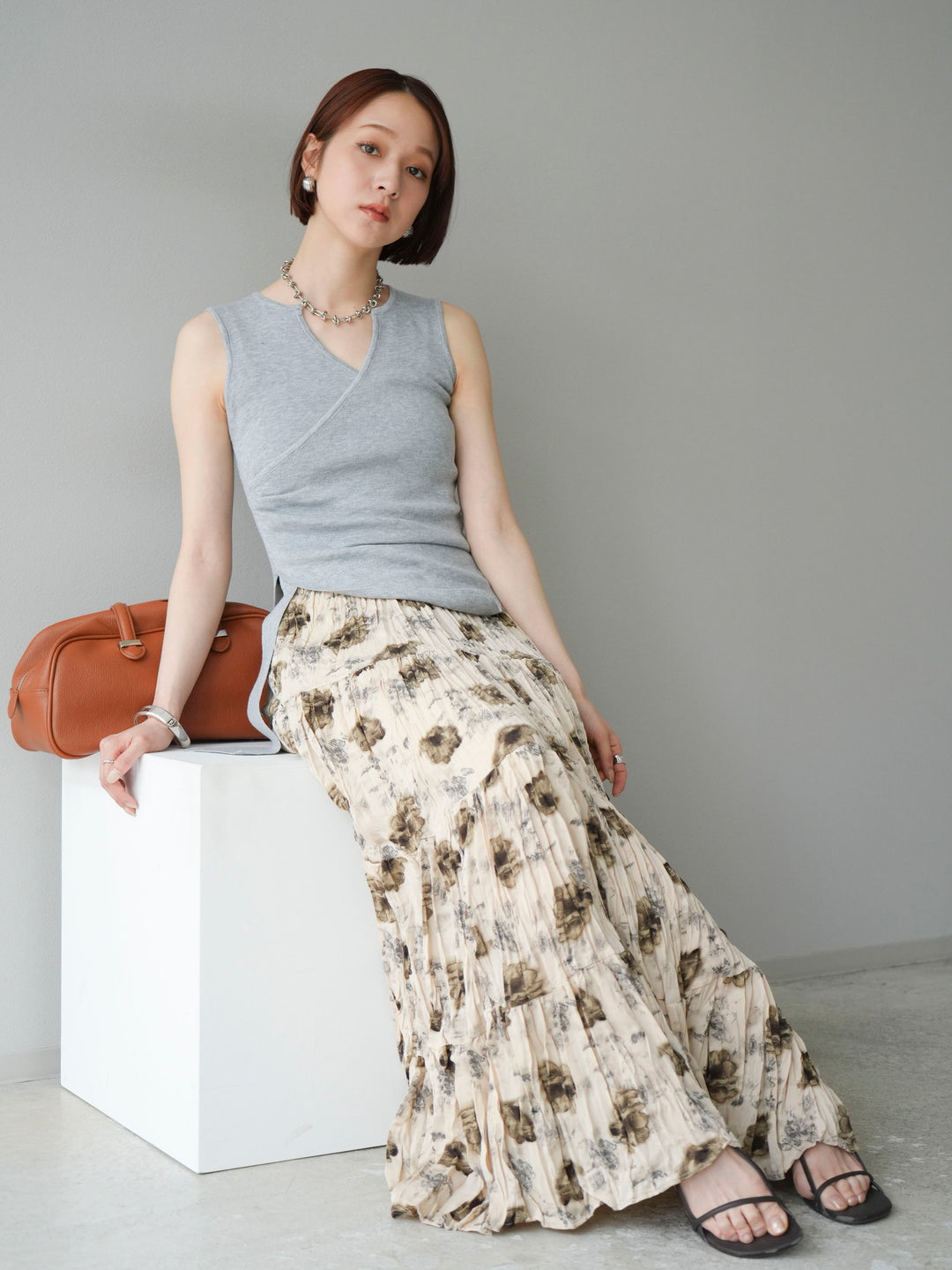 [SET]カシュクールノースリーブニットトップス+フラワーワッシャーロングスカート(2set)