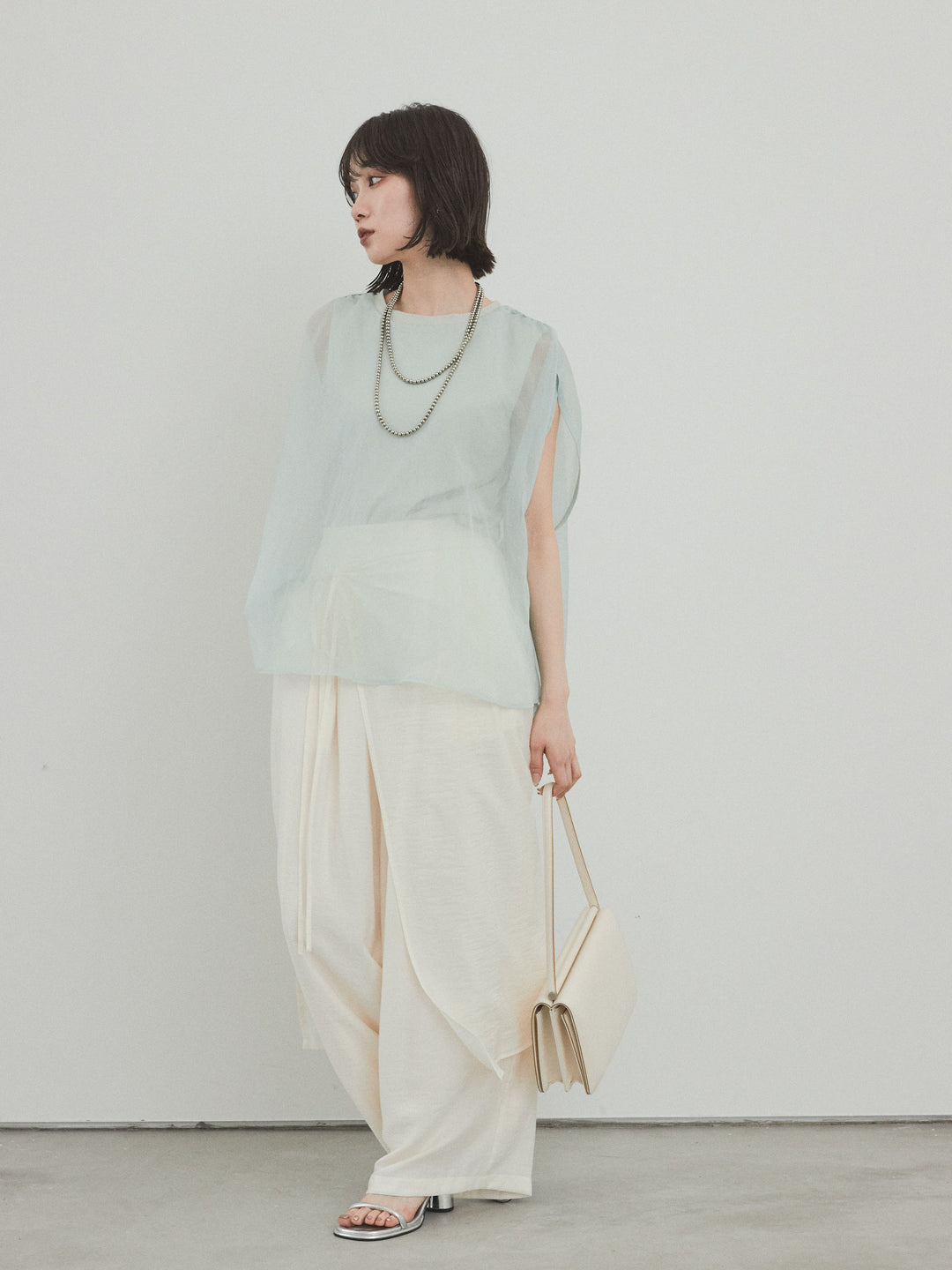 [SET]コンパクトスムースシアーレイヤードトップス+ワッシャーサテンレイヤードスカートパンツ(2set)