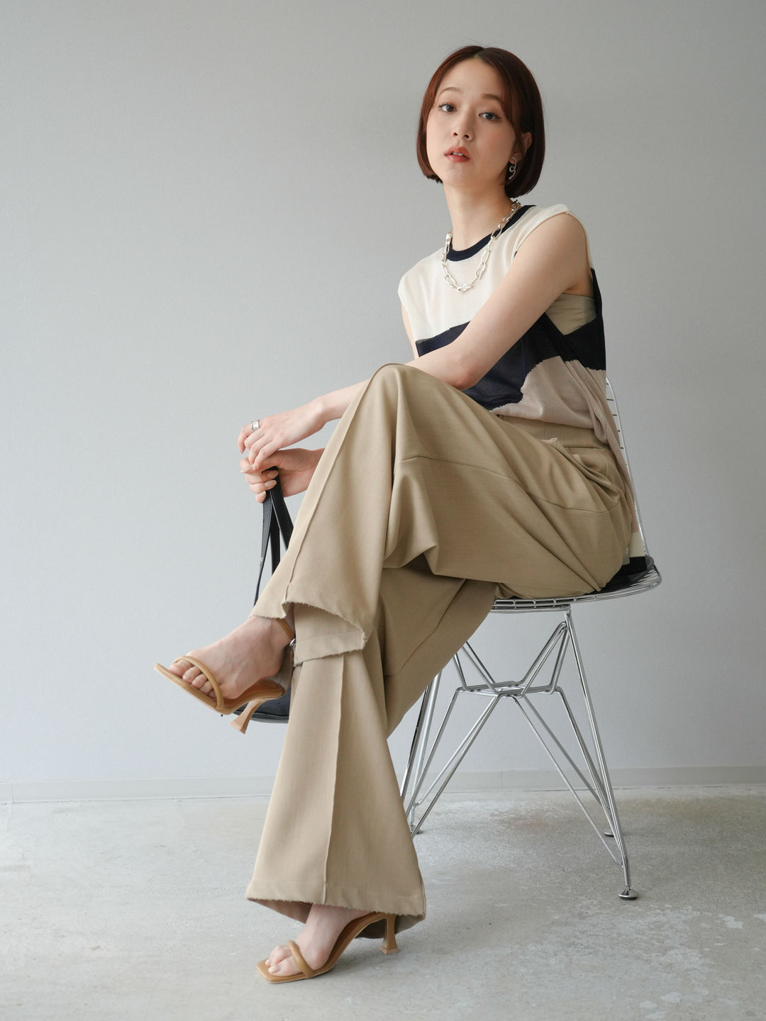 [SET]バイカラーシアーニットノースリーブ+ジップタックワイドパンツ(2set)