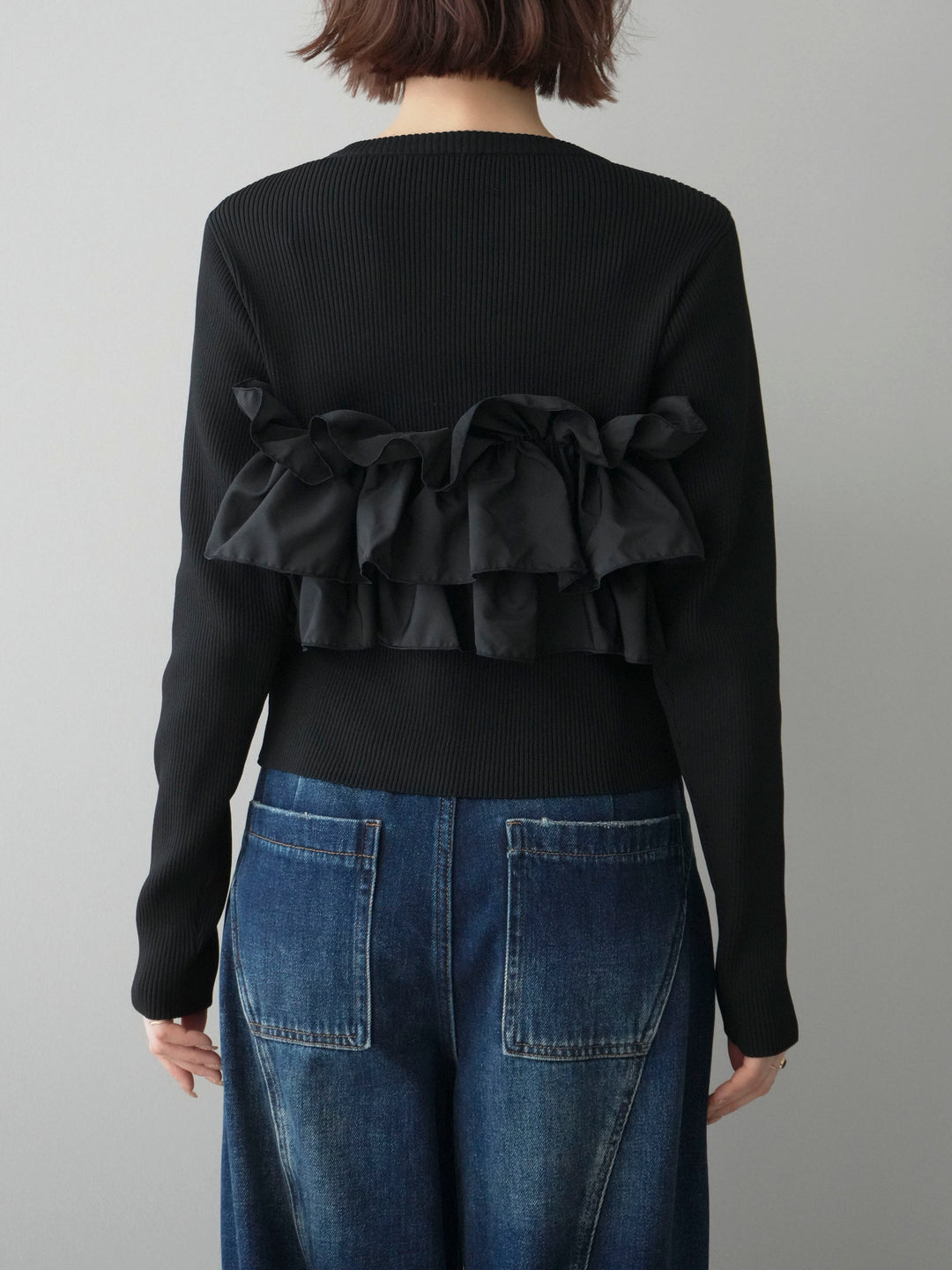 [予約]フリルビスチェドッキングスポンジニットプルオーバー/black