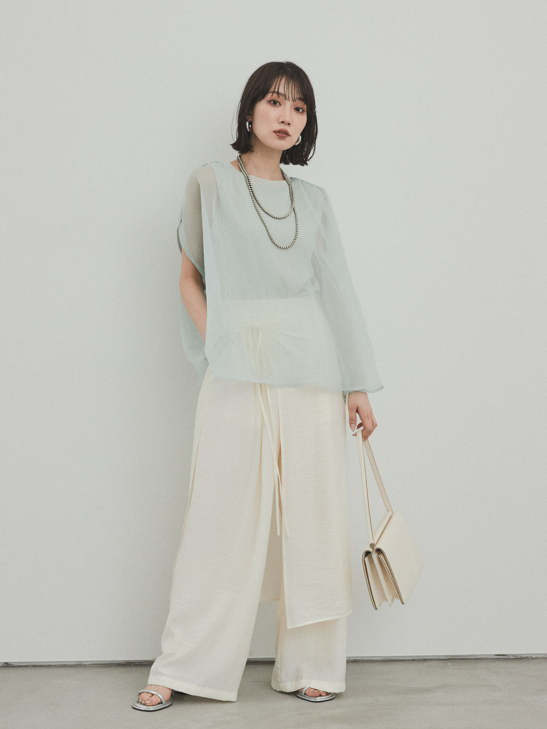 [SET]コンパクトスムースシアーレイヤードトップス+ワッシャーサテンレイヤードスカートパンツ(2set)