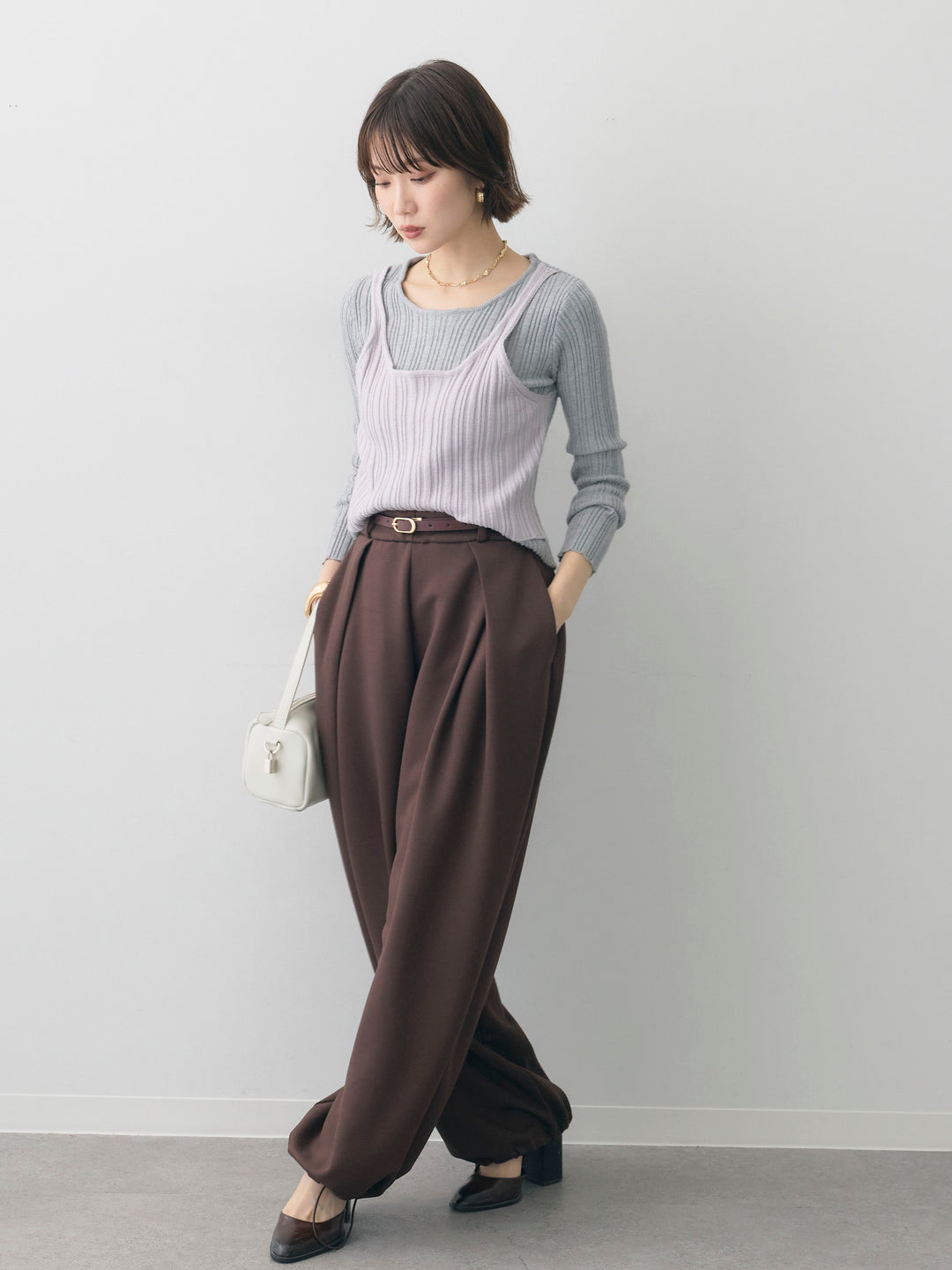 [SET]レイヤードデザインランダムリブニットトップス+ボンディングドロストタックパンツ(2set)
