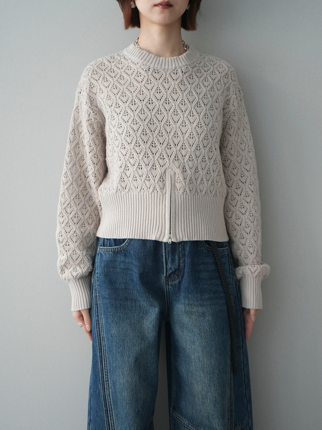 [予約]透かし編みフロントジップスリットニットプルオーバー/lightbeige
