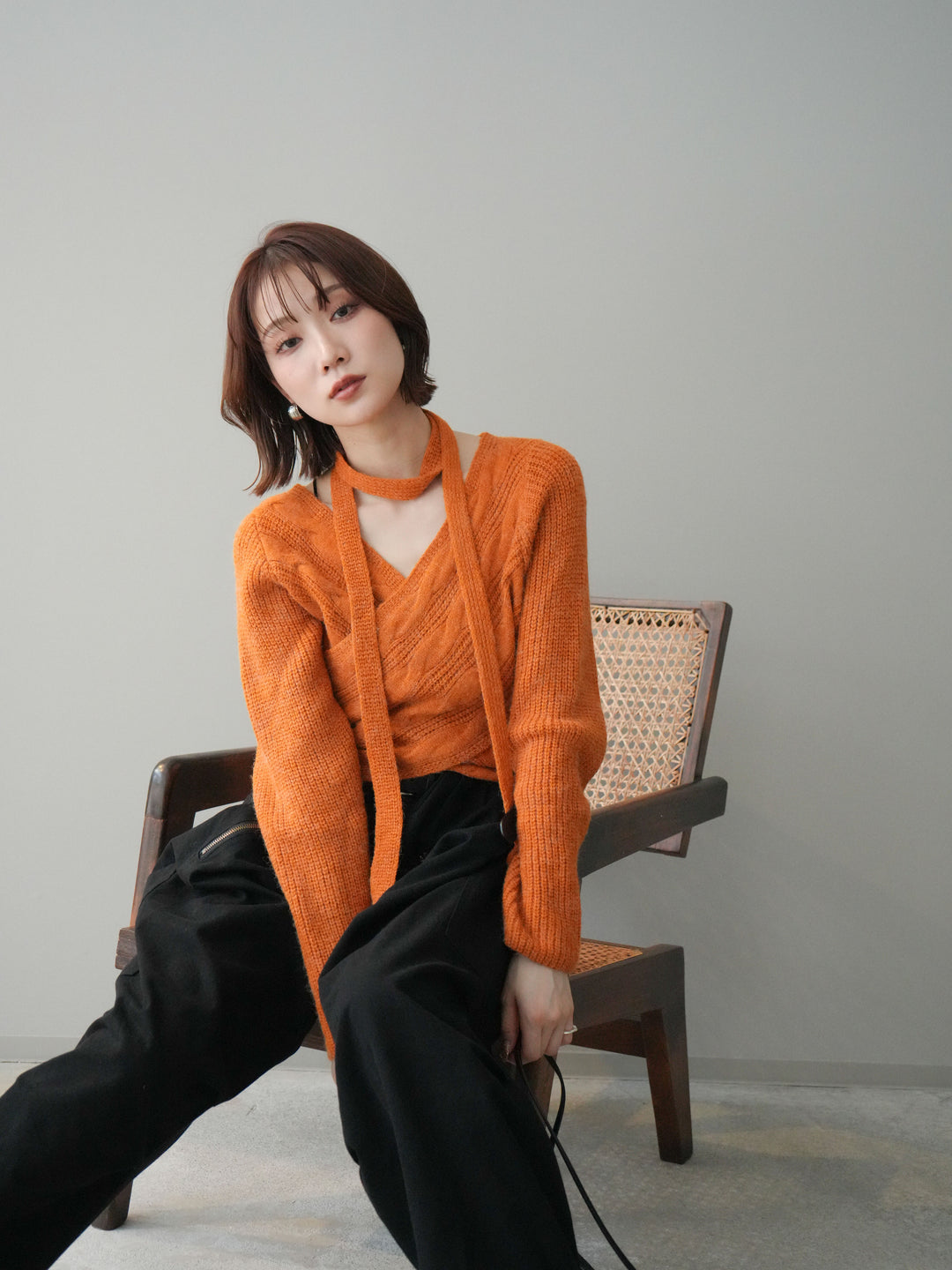 [予約]ケーブル編みクロスニットトップス/orange
