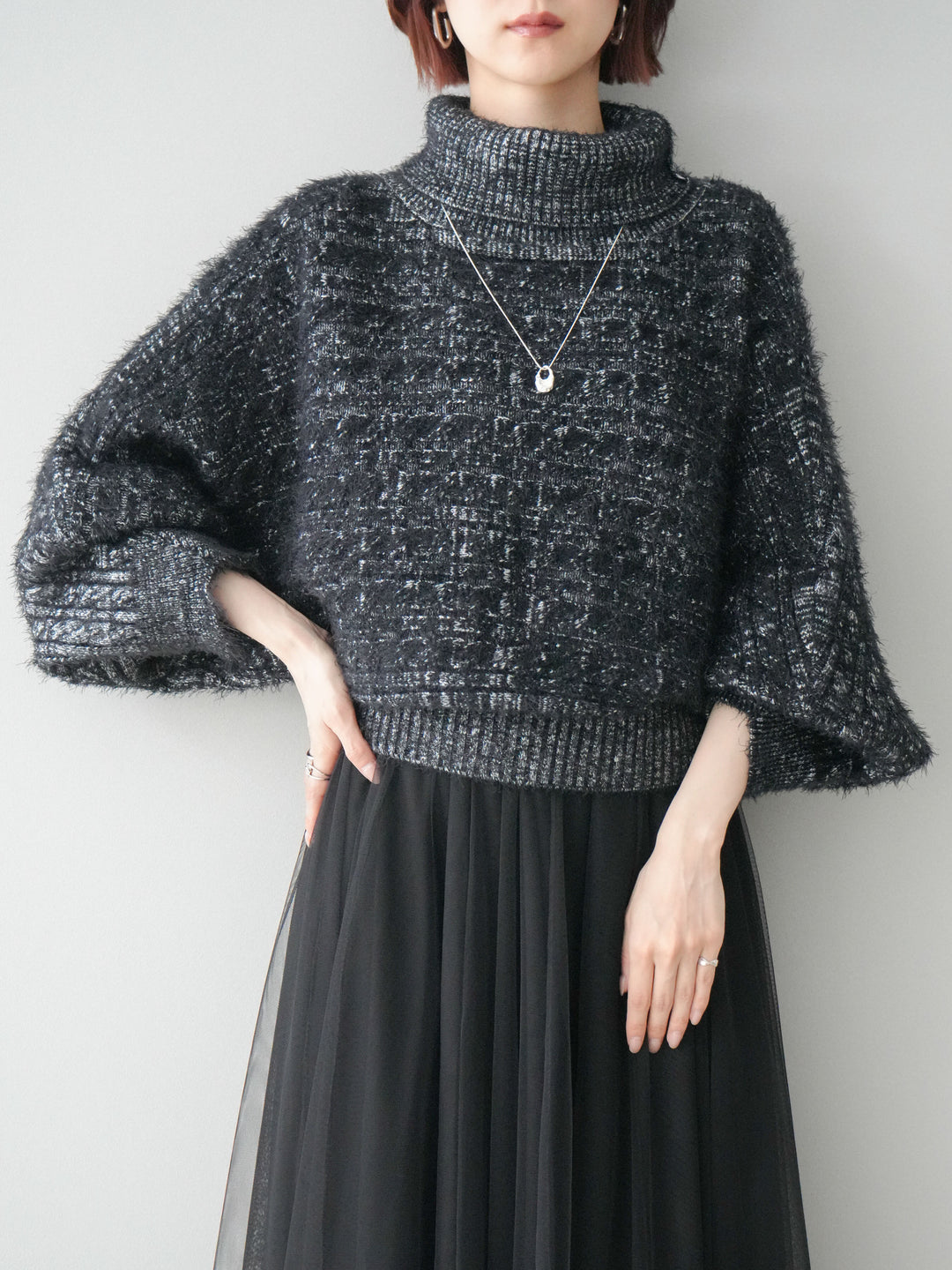 [予約]オフタートルケーブル編みニットプルオーバー/black