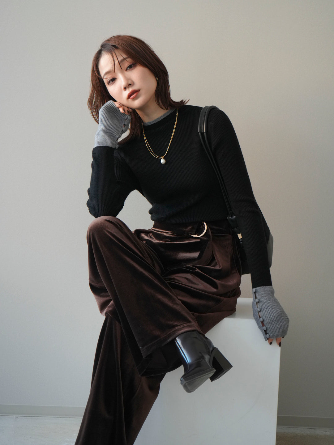 [予約]袖ボタンハイネック配色リブニットトップス/black