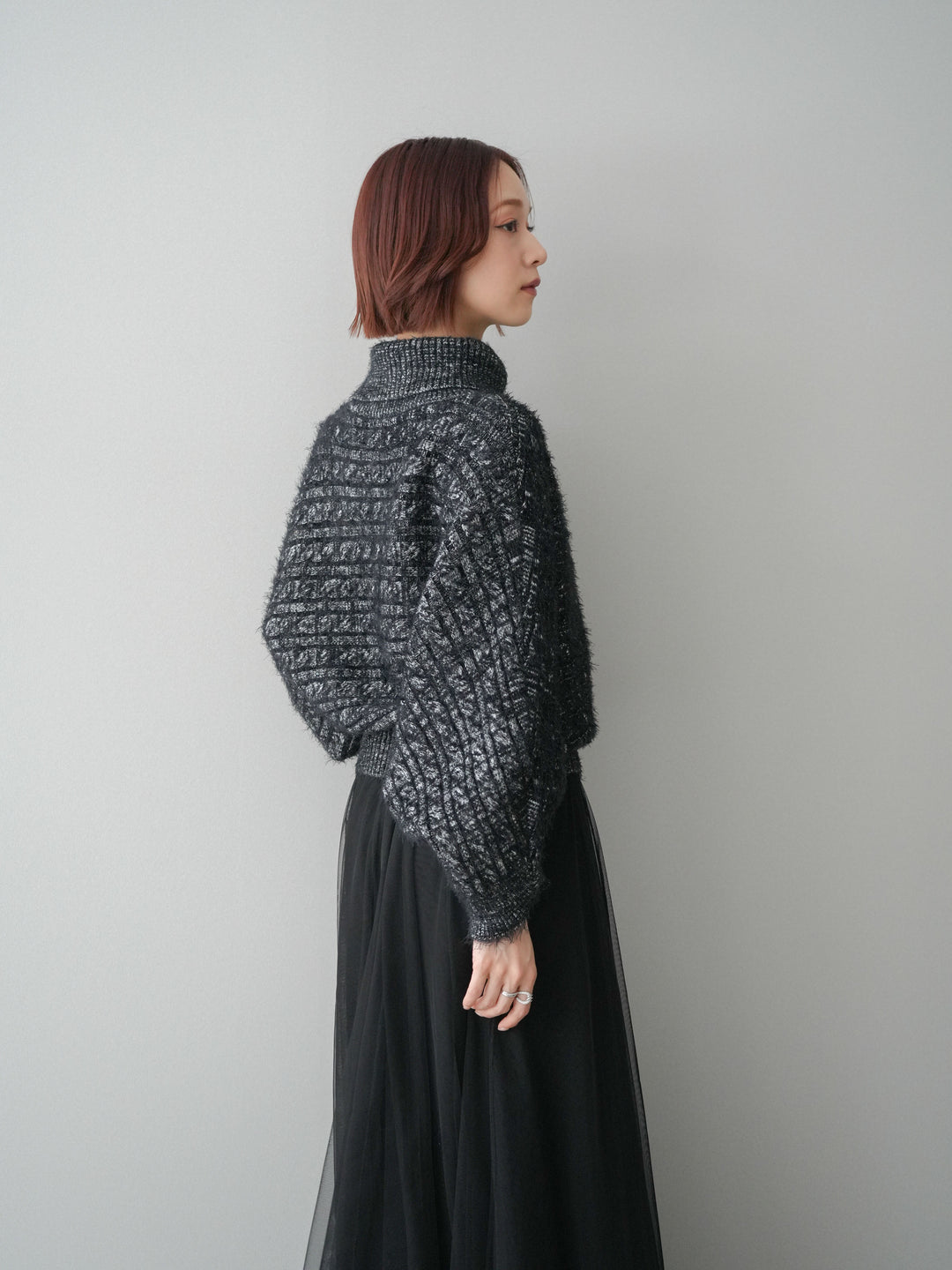 [予約]オフタートルケーブル編みニットプルオーバー/black