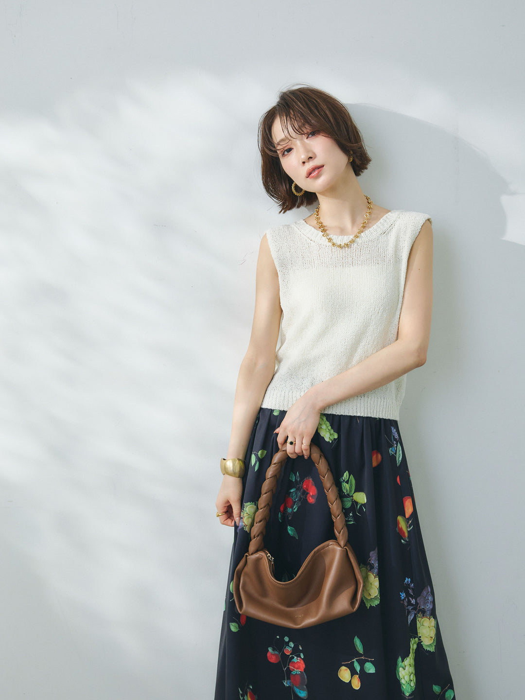 【Allure】[SET]スリーブレスバックスリットニットプルオーバー+ボタニカルプリントフレアスカート(2set)