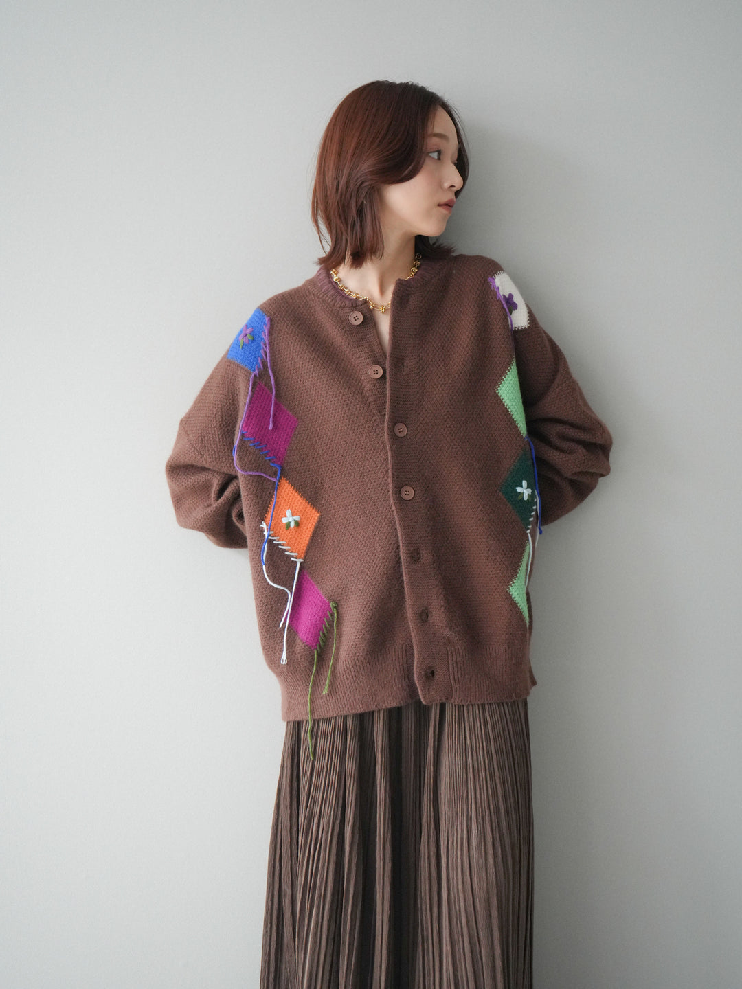 [SET]ハンドステッチアーガイルデザインニットカーディガン+裾レーススウェードプリーツマキシスカート(2set)