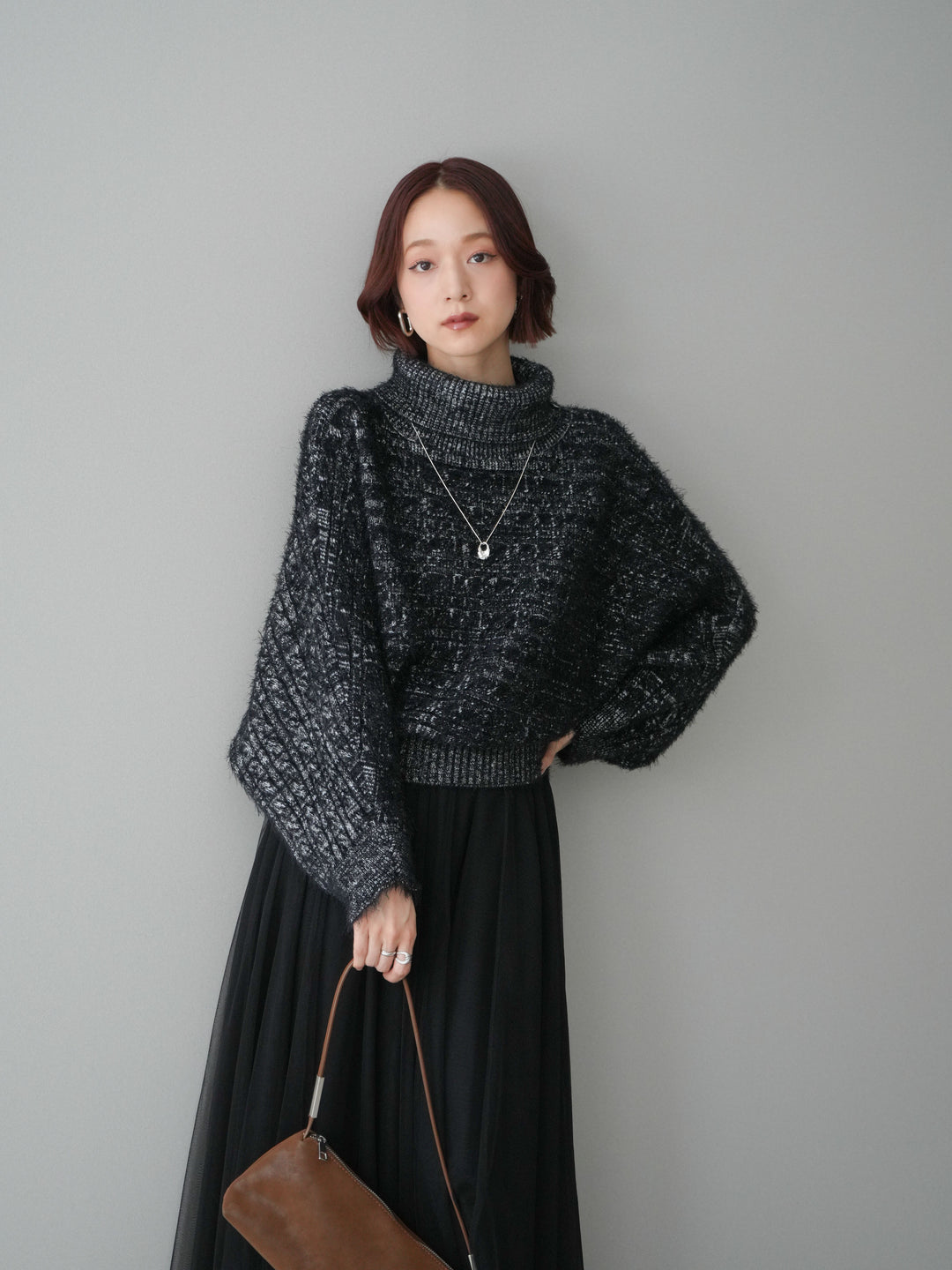 [予約]オフタートルケーブル編みニットプルオーバー/black