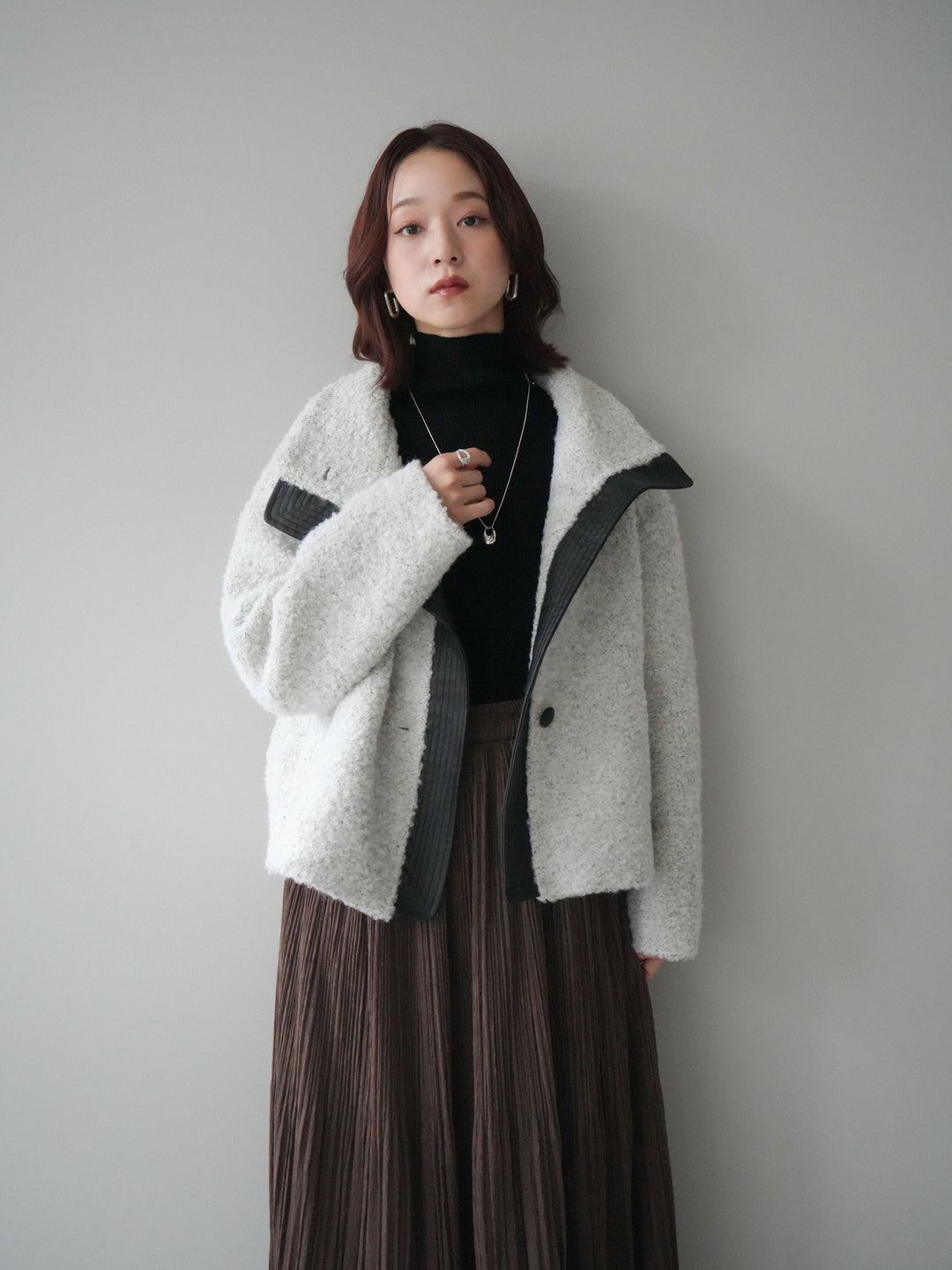 [SET]レザー切替ブークレブルゾン+袖ボタンボトルネックリブニットトップス+裾レーススウェードプリーツマキシスカート(3set)