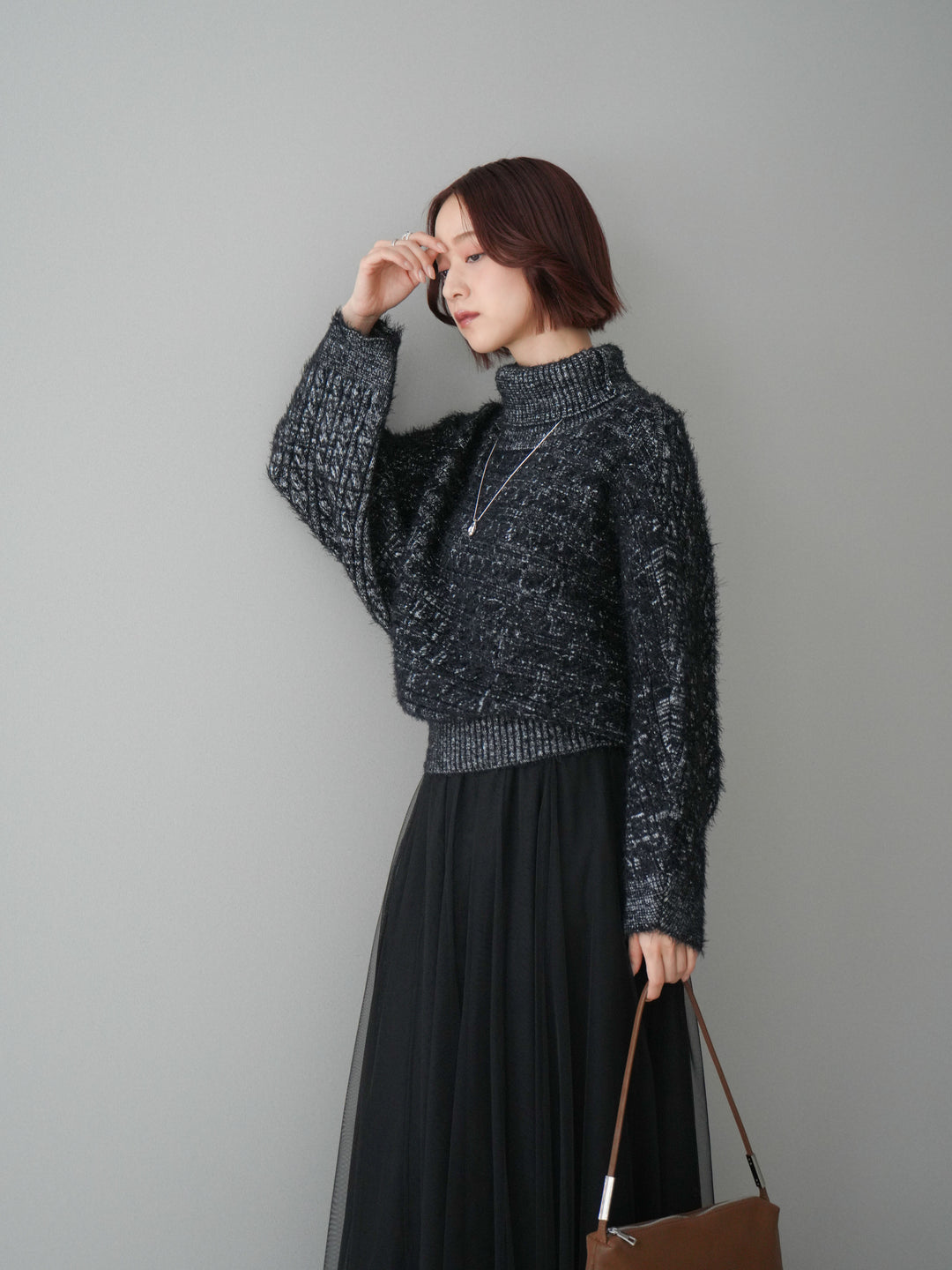 [予約]オフタートルケーブル編みニットプルオーバー/black