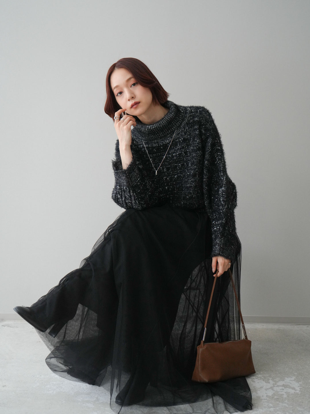 [予約]オフタートルケーブル編みニットプルオーバー/black