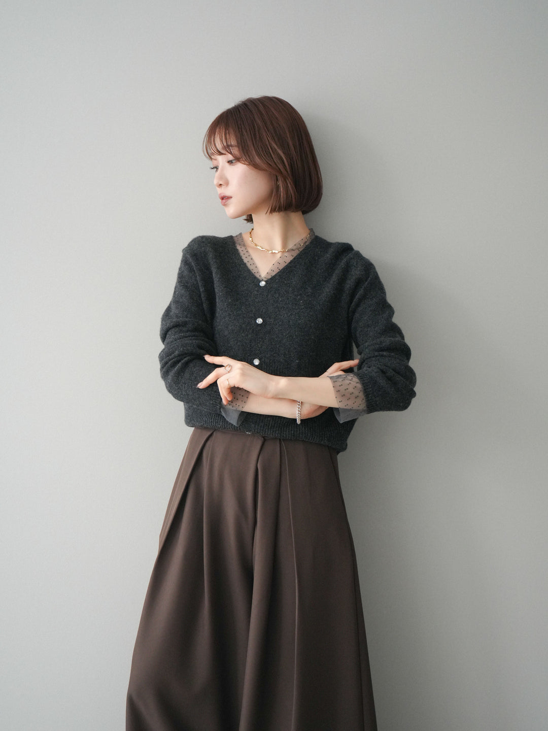 [SET]ドットチュールレイヤードボタンニットトップス+テープベルトタックバギーパンツ(2set)