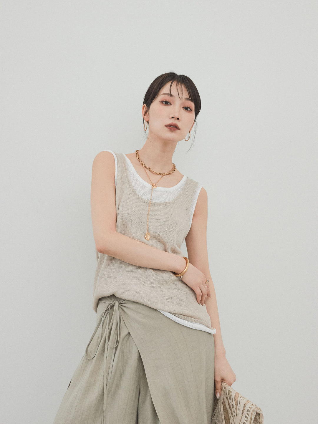 [SET]バイカラーレイヤードニットタンクトップ+ワッシャーサテンレイヤードスカートパンツ(2set)