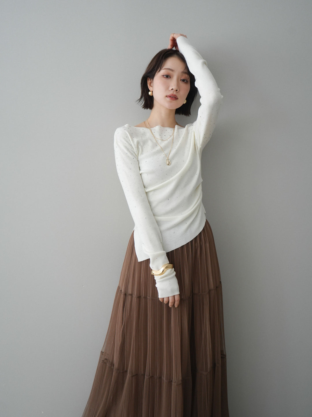 [予約]ラインストーンアシンメトリーニットトップス/ivory