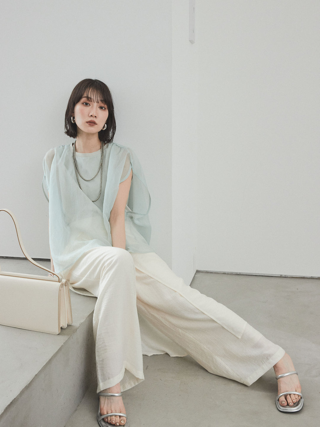 [SET]コンパクトスムースシアーレイヤードトップス+ワッシャーサテンレイヤードスカートパンツ(2set)