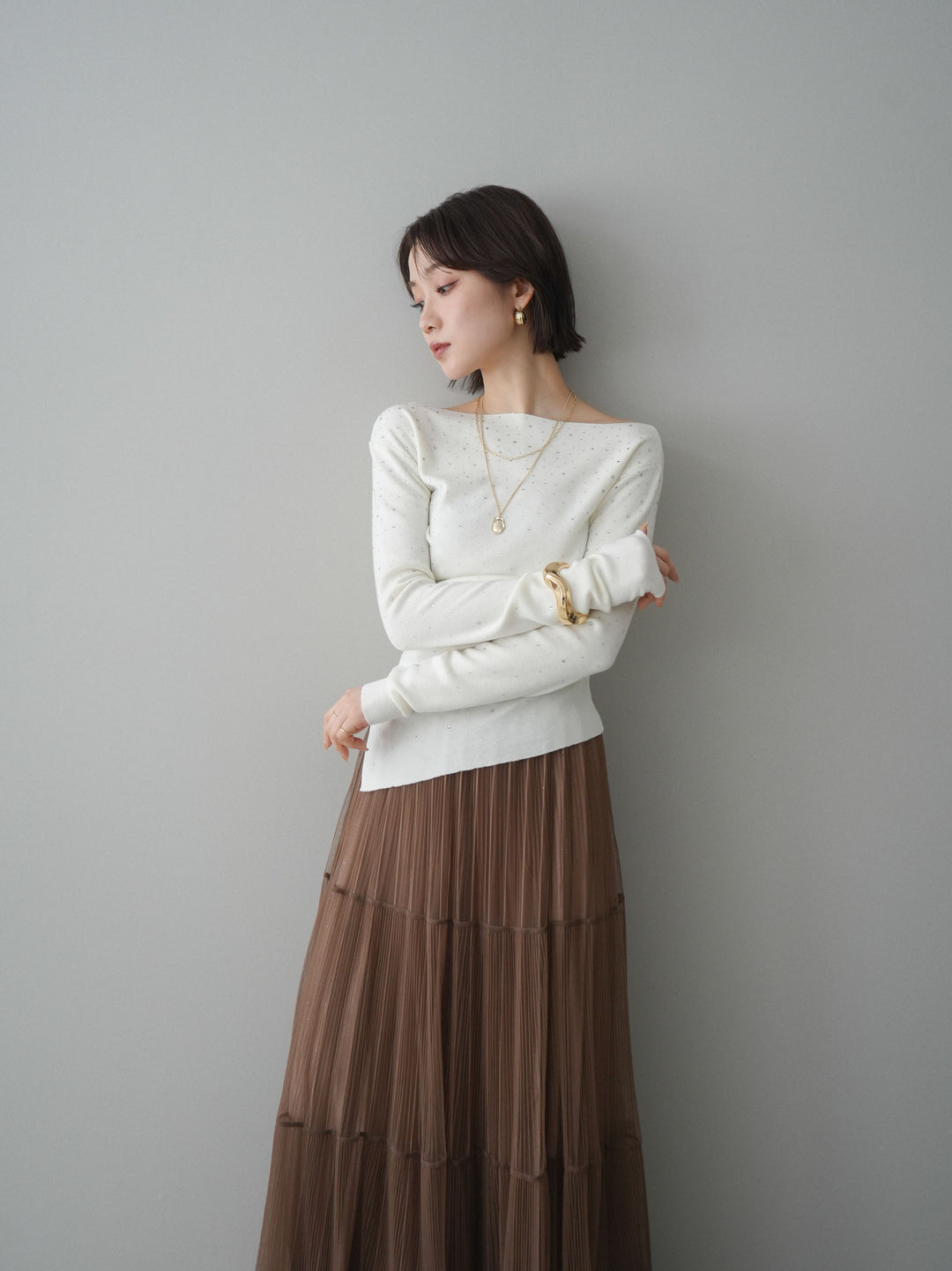 [予約]ラインストーンアシンメトリーニットトップス/ivory