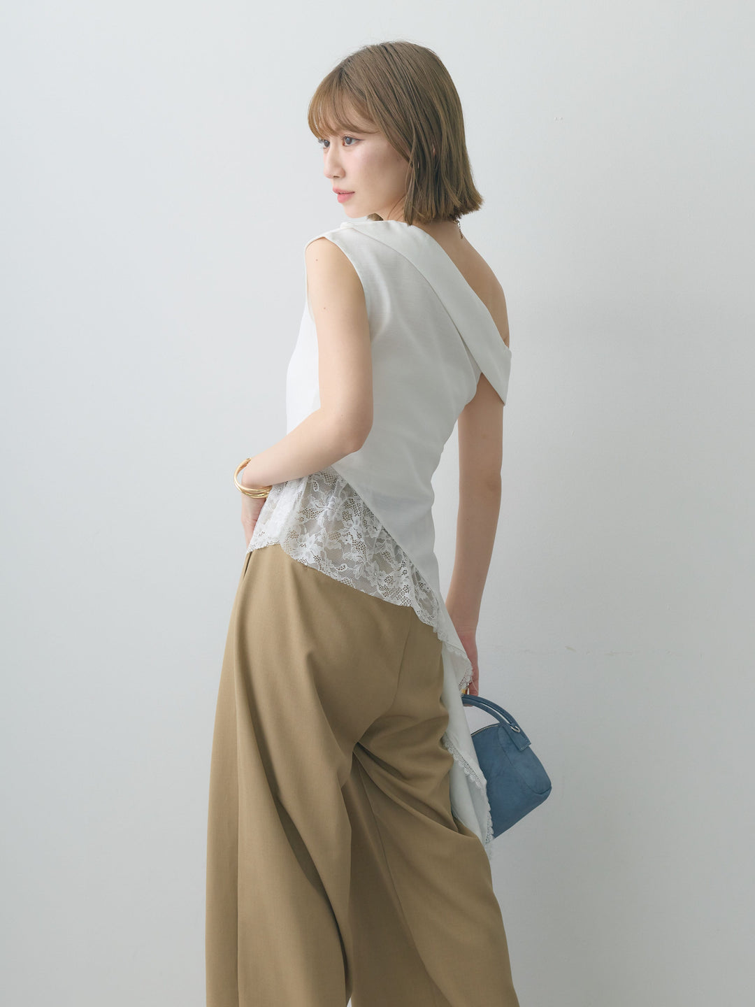 [SET]アシンメトリーラッフルレースヘムトップス+クレープデシンタックワイドパンツ(2set)