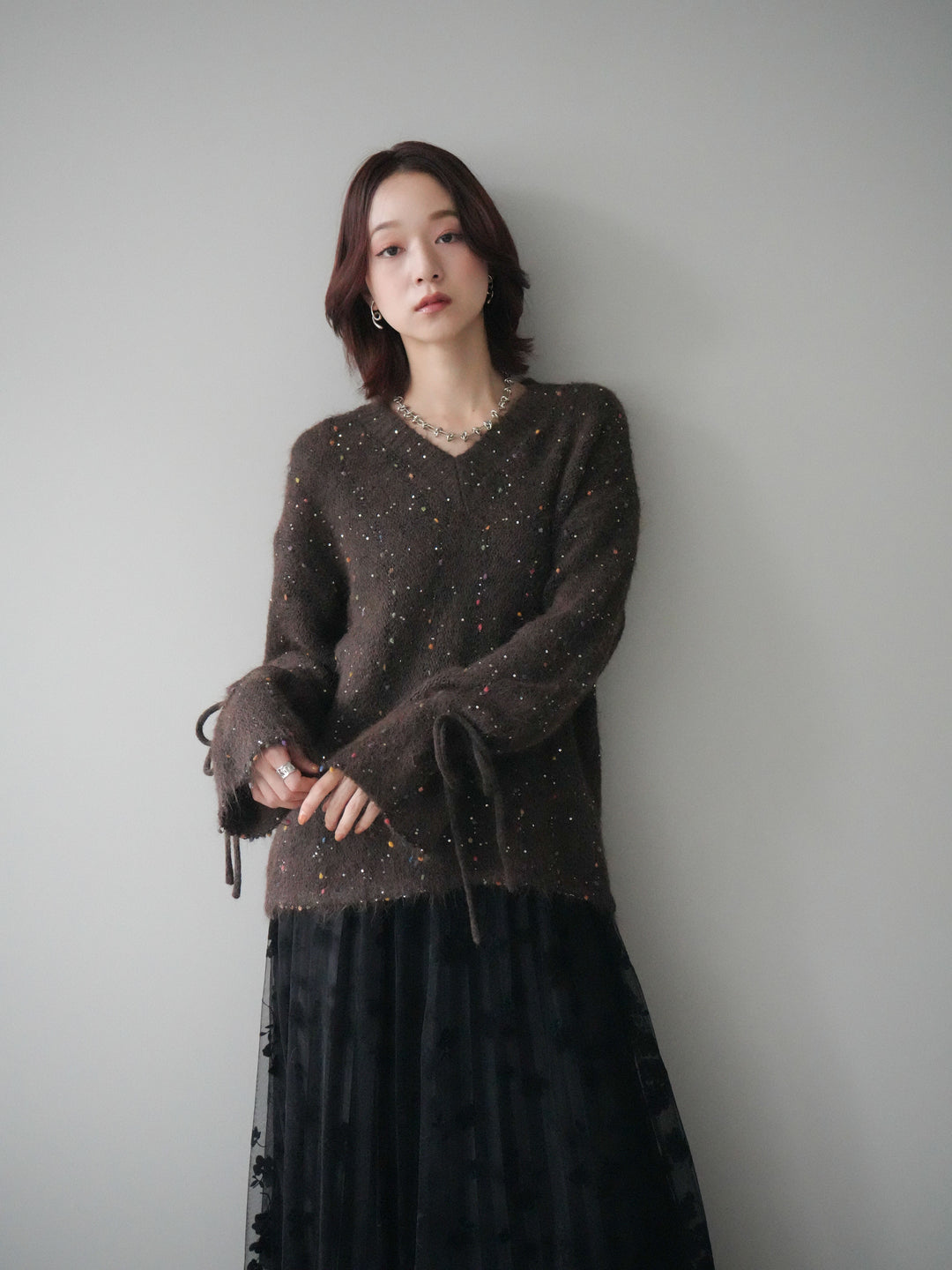 [SET]キャンディースリーブカラーネップスパンコールニットプルオーバー+フラワーフロッキーチュールプリーツスカート(2set)