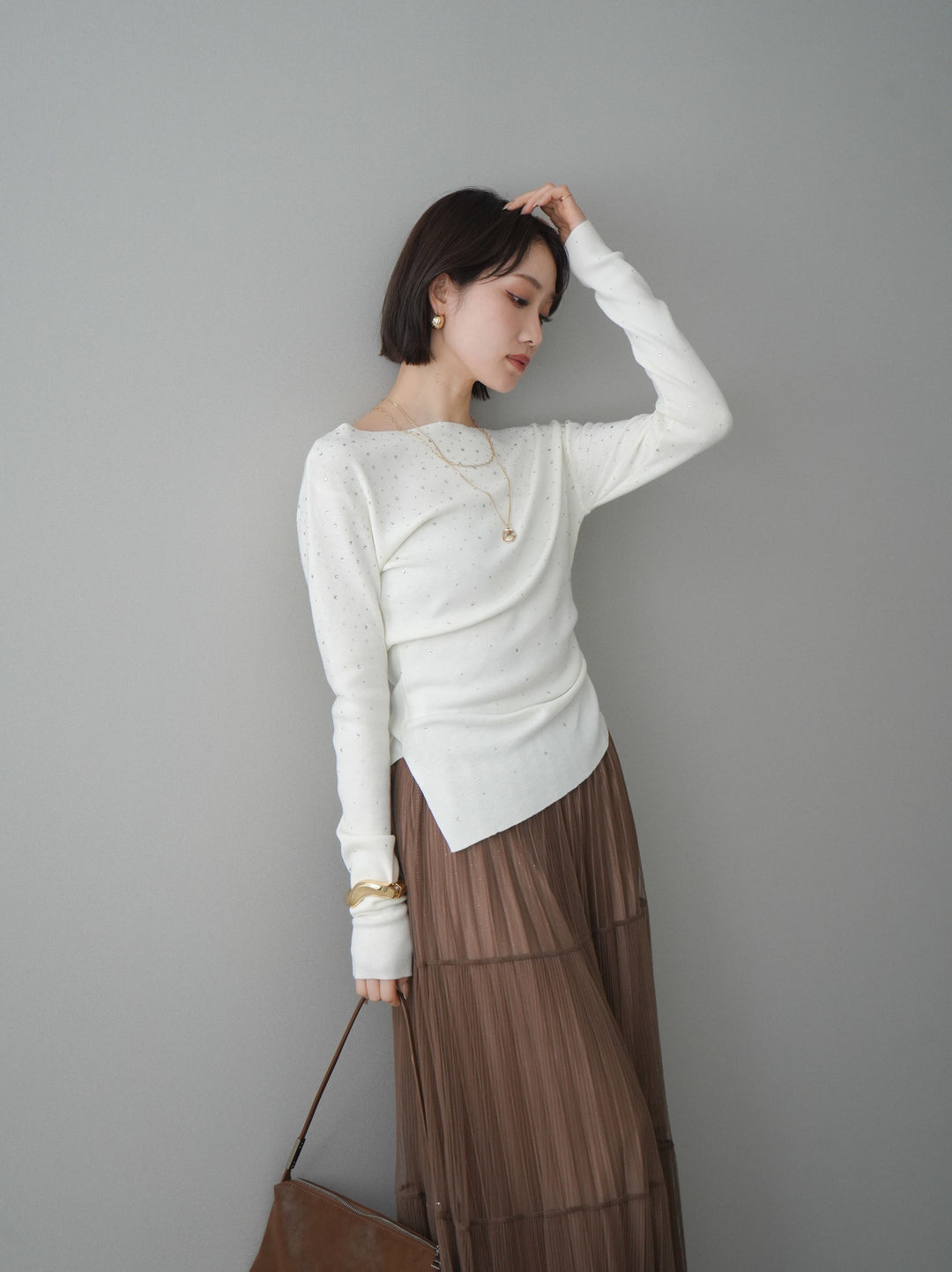 [予約]ラインストーンアシンメトリーニットトップス/ivory