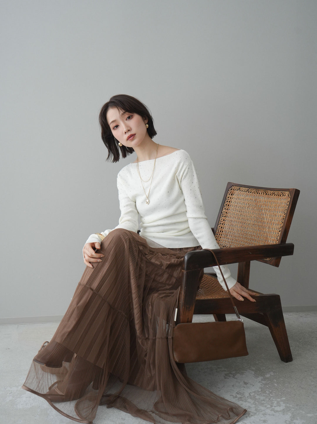 [予約]ラインストーンアシンメトリーニットトップス/ivory