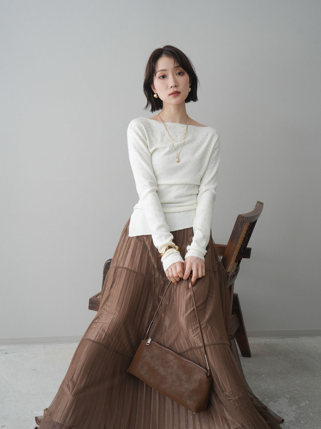 [予約]ラインストーンアシンメトリーニットトップス/ivory