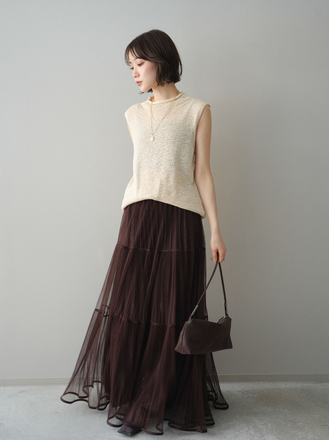 [SET]ノースリーブリネンタッチシアーニットプルオーバー+ラメプリーツレイヤードチュールロングスカート(2set)