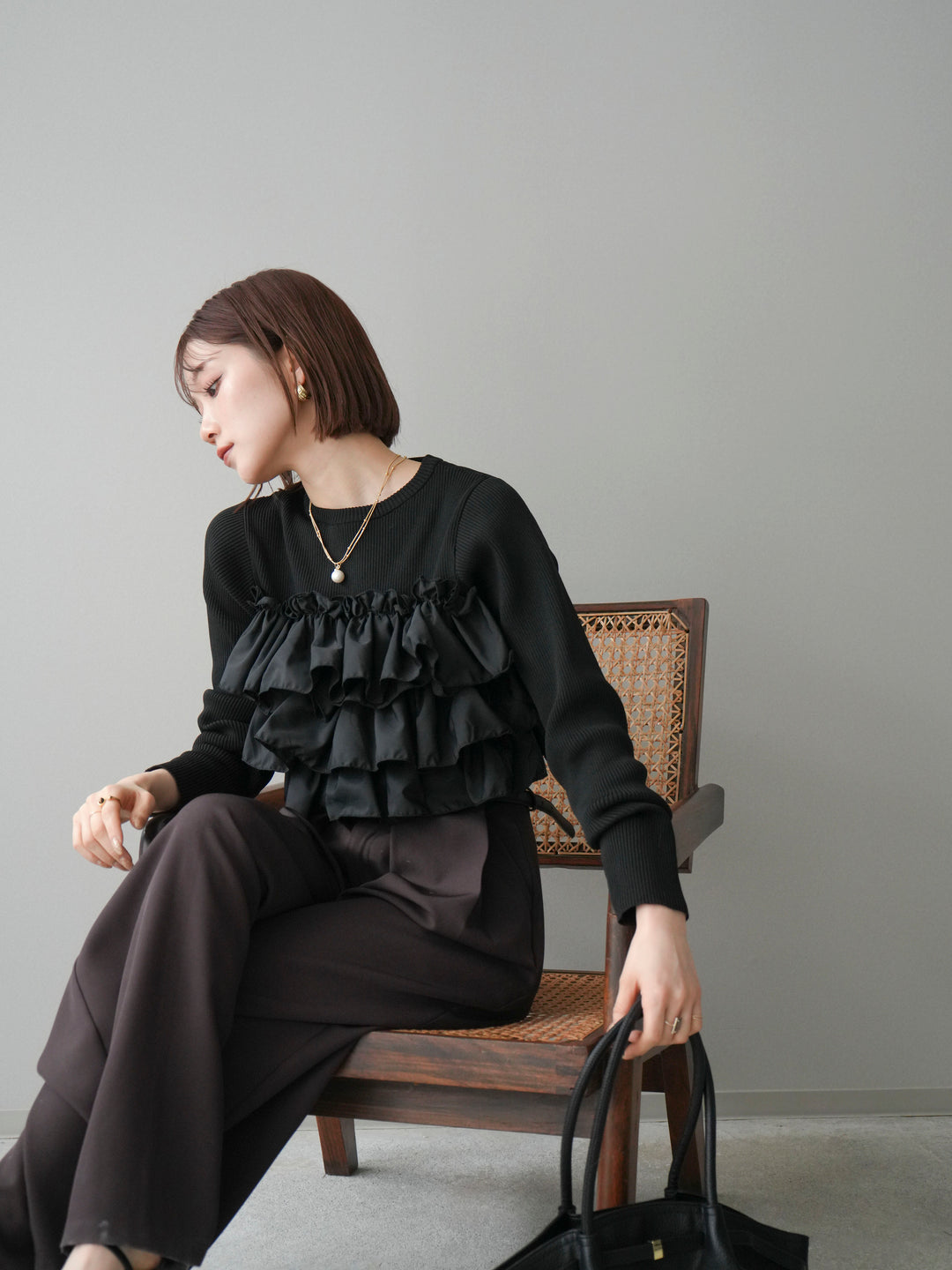 [予約]フリルビスチェドッキングスポンジニットプルオーバー/black