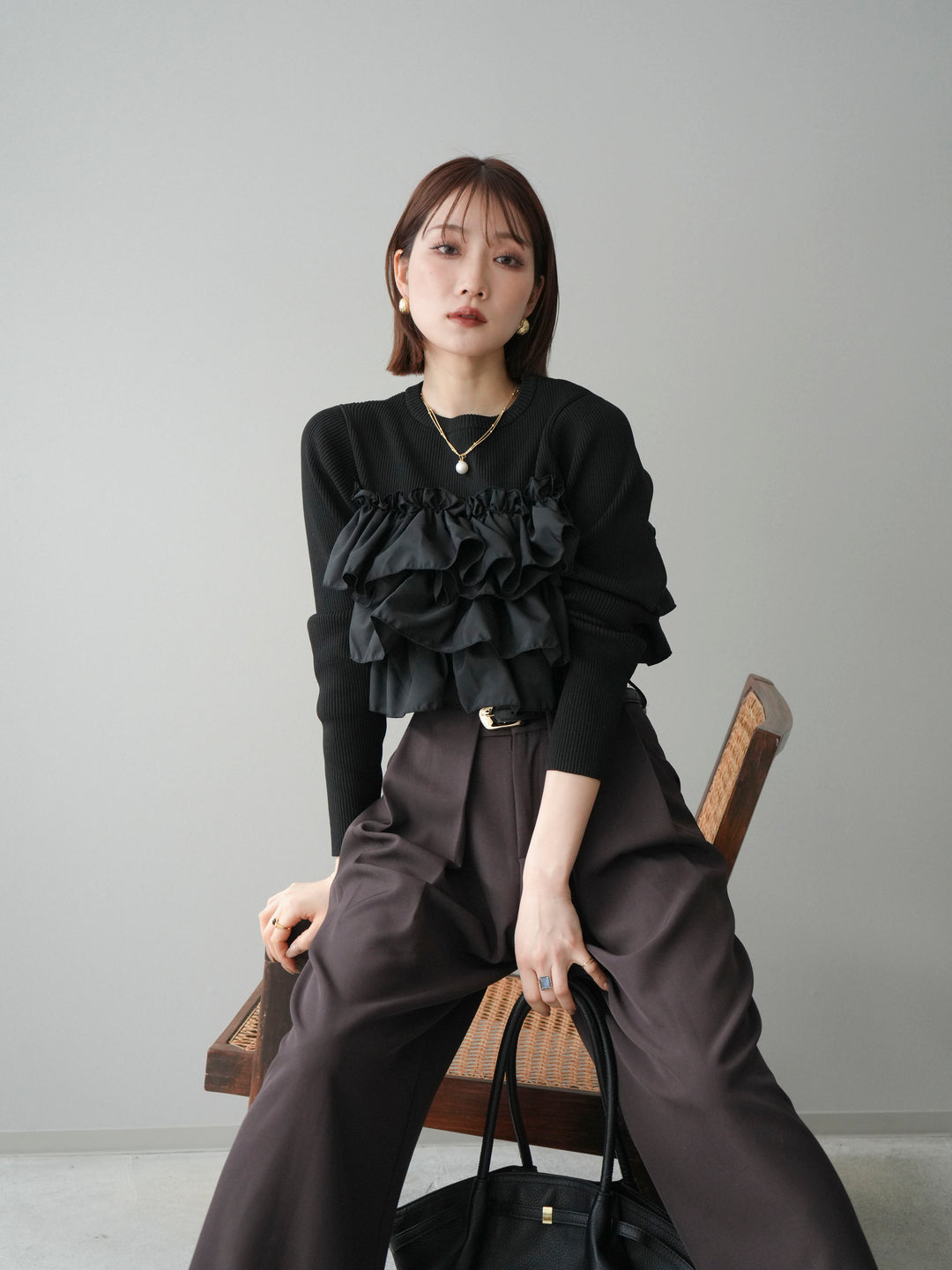 [予約]フリルビスチェドッキングスポンジニットプルオーバー/black