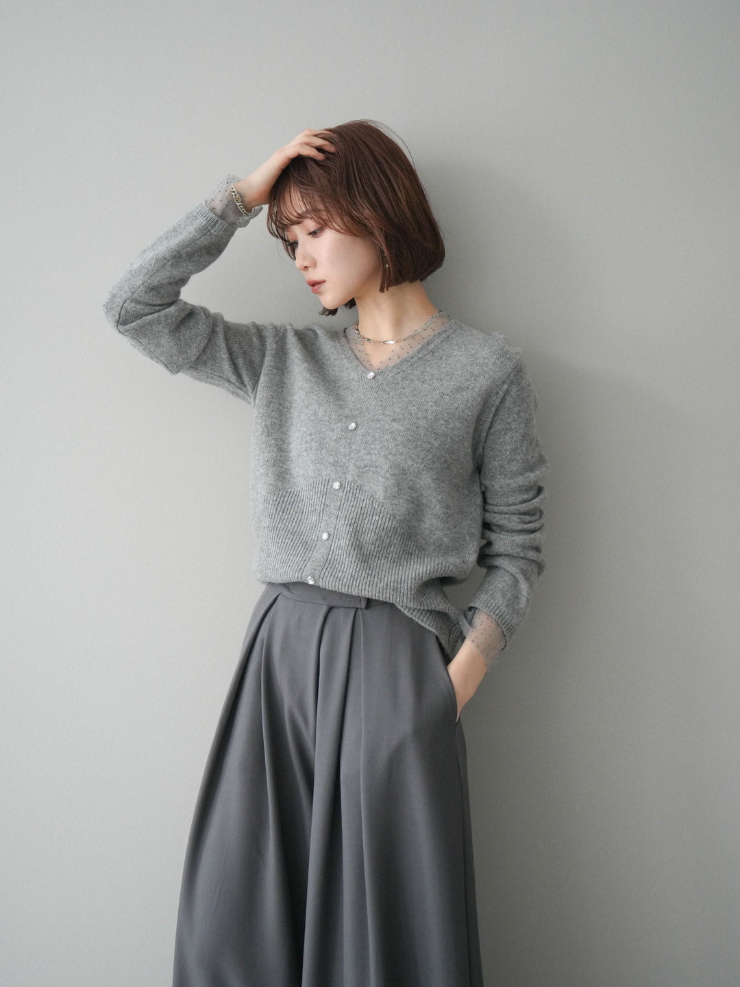 [SET]ドットチュールレイヤードボタンニットトップス+テープベルトタックバギーパンツ(2set)