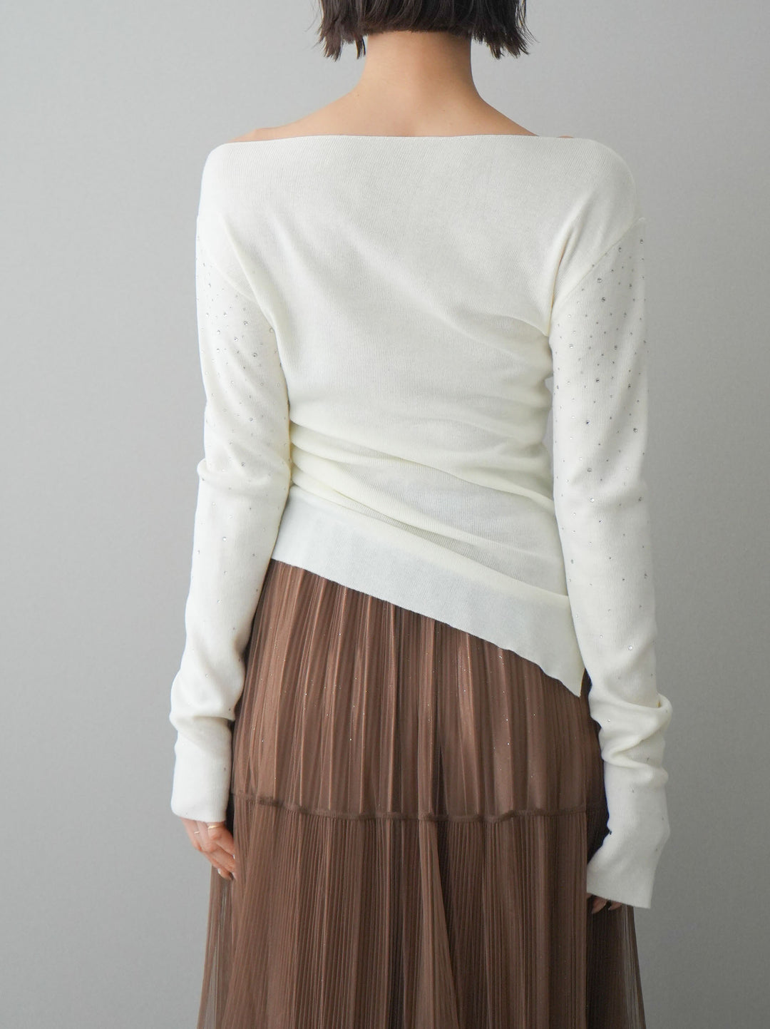 [予約]ラインストーンアシンメトリーニットトップス/ivory